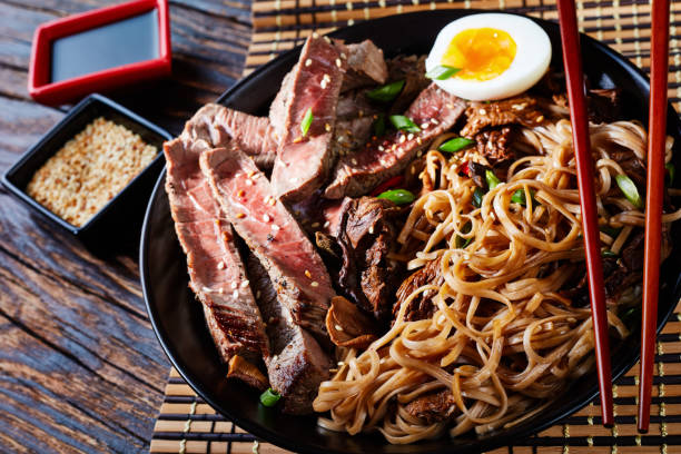 istock a bowl of soba with sliced roast beef 1065352560