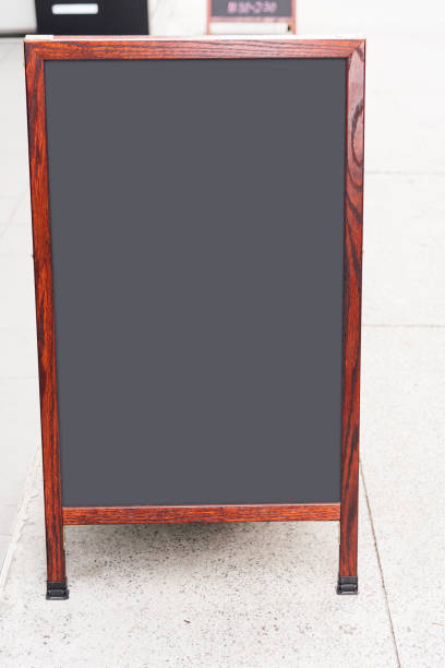 istock Blank chalk board street stand mockup, retro 1065354356