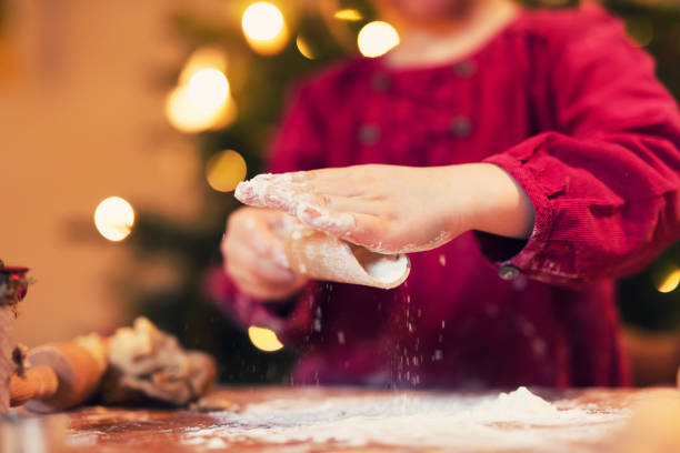 istock Real christmas bakery - Child is making christmas cookies 1065357834