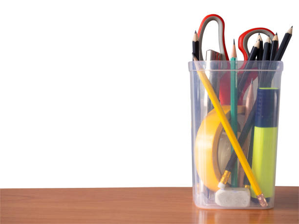 istock Stationery Supplies on wooden table. 1065357848
