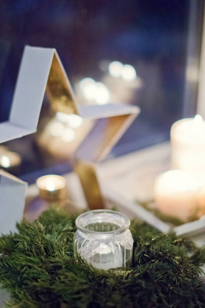istock Christmas composition with candles and wreath 1065358698
