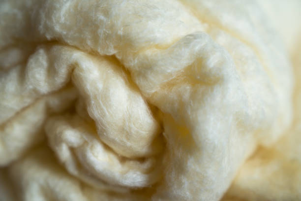 istock Soft fabric of threads extracted from the cocoon of the silkworm 1065362430