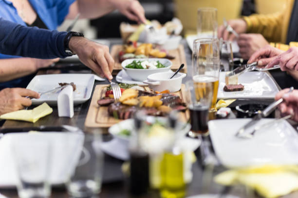 People are dining in a restaurant stock photo