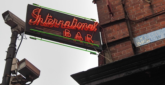 5th November 2018, Dublin. International Bar illuminated sign in Wicklow Street, with CCTV cameras to the left.