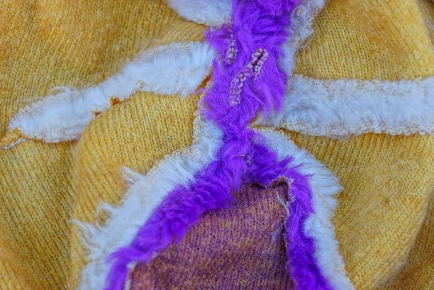 istock colored fabric texture from a piece of wool with seams 1065367710