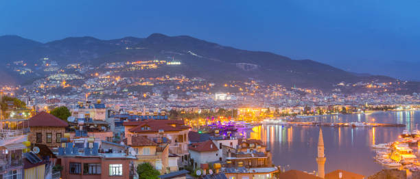 istock Alanya harbor after sunset, Turkey 1065373250
