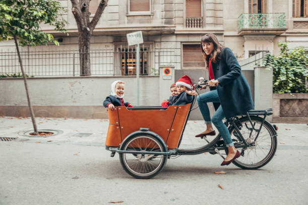 istock Mother riding bicycle during christmas 1065380444