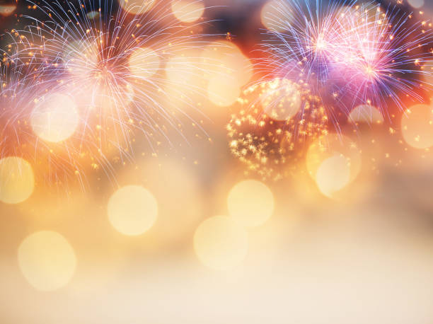istock new year background with fireworks and holiday lights 1065392932