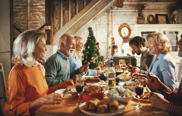 istock Family having Thanksgiving dinner. 1065395114