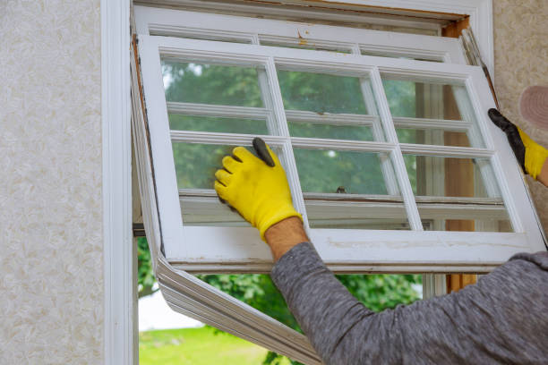 Workers preparing to master removes old wooden windows Workers preparing to master removes old wooden windows in home renovation, energy efficiency concept. replacement stock pictures, royalty-free photos & images