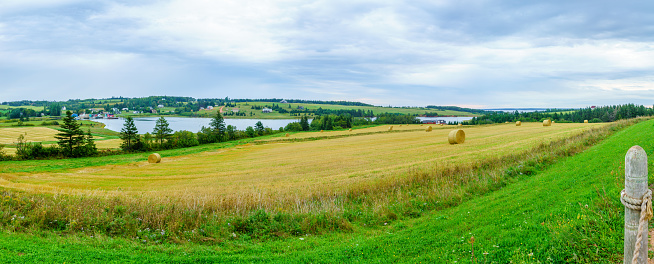 Panoramic view of countryside and haystacks near French River, Prince Edward Island, Canada