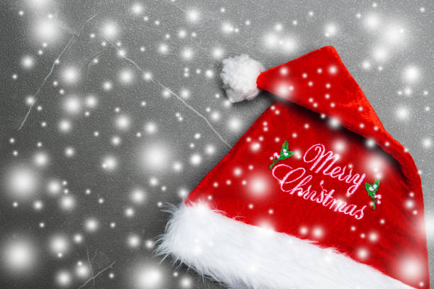 istock Top view chrismas hat  copy space with snowflake . 1065407058
