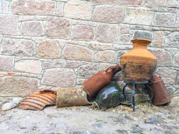 Rural countryside wall surface with ancient amphoras