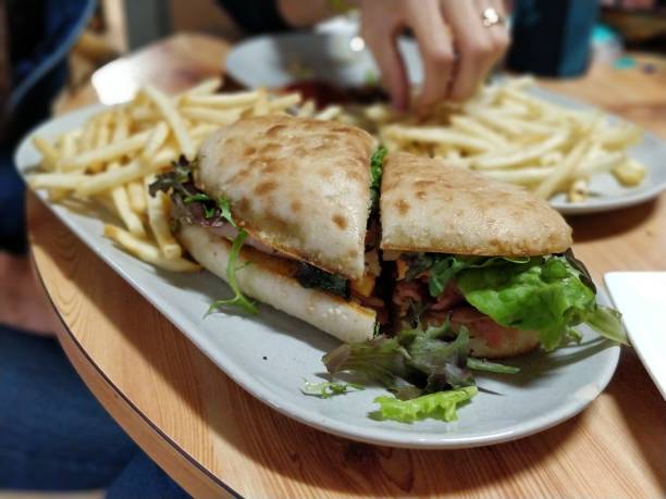 istock big sandwich with fries 1065408802
