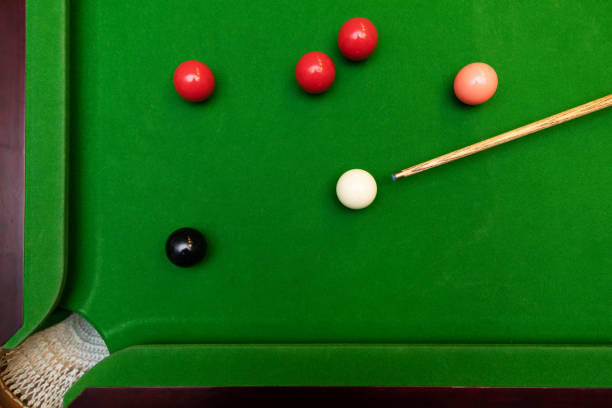 black ball shot in snooker game. top view