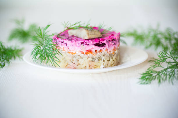 istock layered salad of boiled vegetables with beets and herring 1065413656
