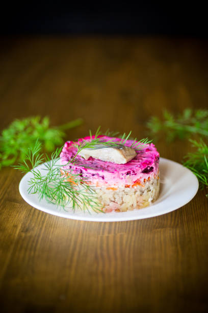 istock layered salad of boiled vegetables with beets and herring 1065413854