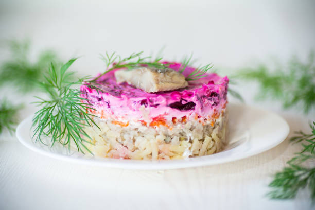istock layered salad of boiled vegetables with beets and herring 1065413962