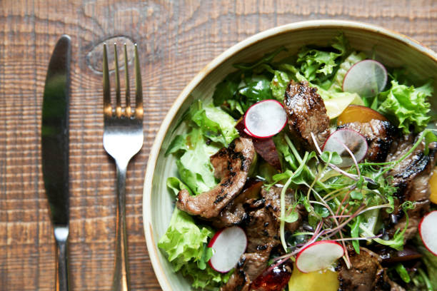 istock Beef salad with radish, peach and green vegetables 1065417080