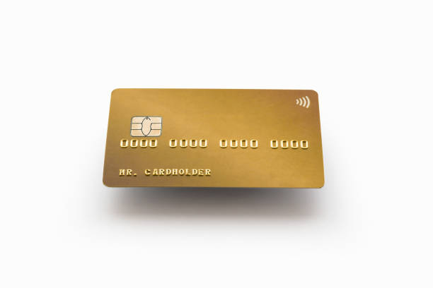 istock Gold credit card on white background with shadow 1065420498