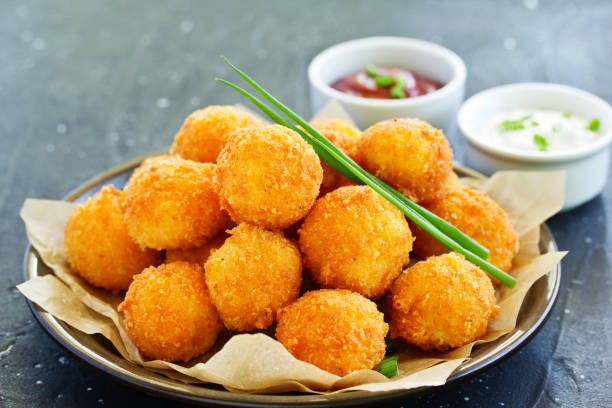 istock cheese balls with tomato sauce. 1065420766