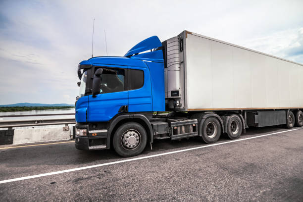 istock Blue truck with refrigerator trailer 1065422086