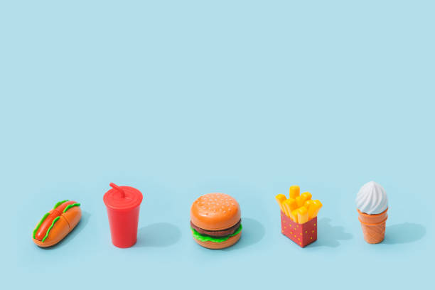 istock Fast food items on pastel blue background. 1065428118