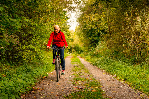 istock woman riding a bicycle 1065433524