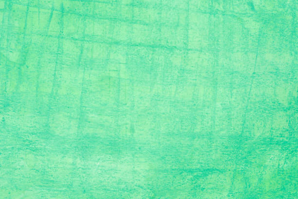 green artistic background texture made with watercolor and crayon on paper