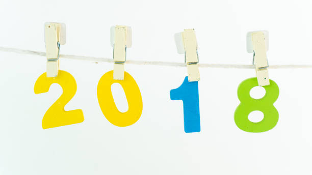 istock Happy new year 2018 show text number hanger on the rope 1065436444
