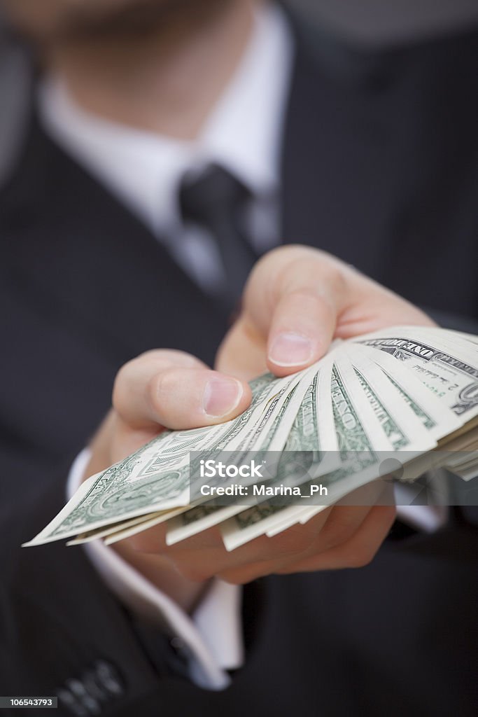 hands holding american dollars  Adult Stock Photo