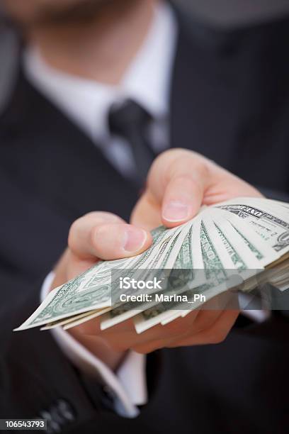 Hands Holding American Dollars Stock Photo - Download Image Now - Adult, Bank - Financial Building, Bribing