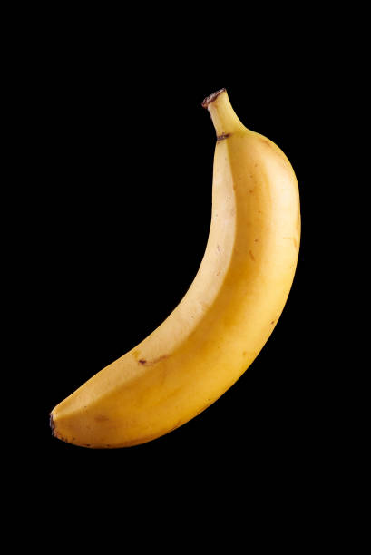 istock banana on a black background 1065439222