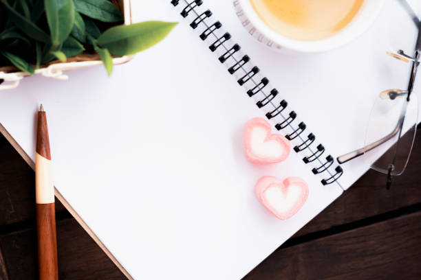 istock hot green tea , healthy fresh drink. copy space on white paper note book. 1065439328