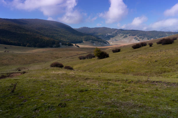 istock Mountain landscape between valleys and autumn woods 1065439962