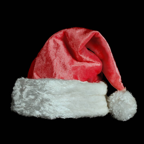 istock a christmas santa claus hat on black background 1065440648