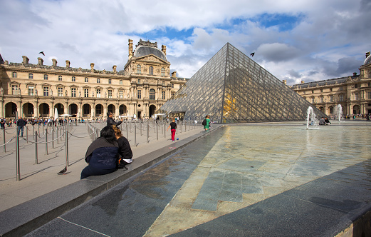 Paris, France, September 6, 2018 - Louvre Museum and the glass pyramid, one of the most famous museums in the world, Paris, France