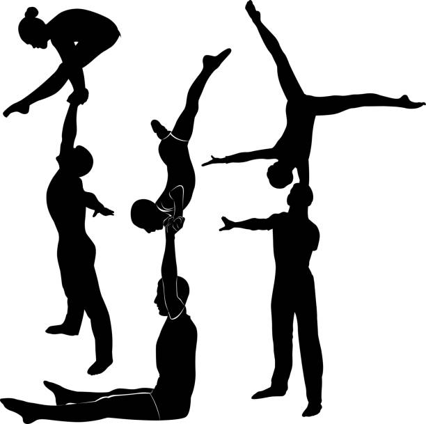 istock Gymnasts acrobats vector black silhouette 1065440838