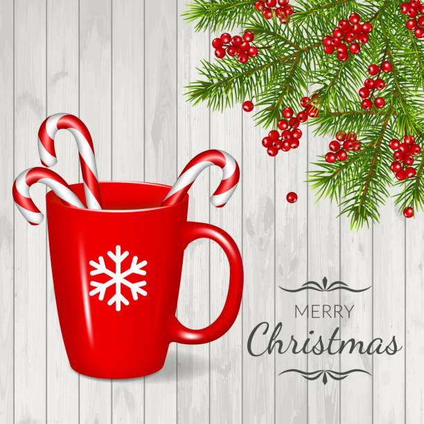 istock Merry Christmas greeting card with fir branches, red cup and candy cane, isolated on wood background. 1065443770