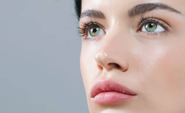 istock Young woman with contact lenses 1065443828