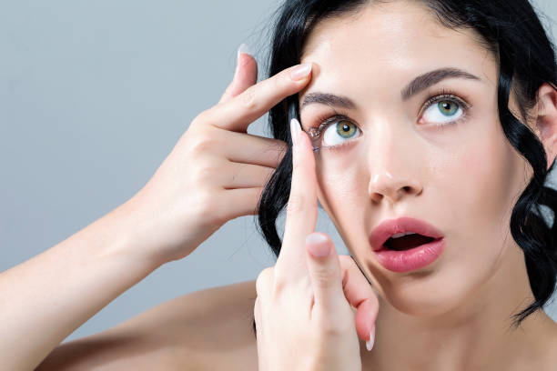 istock Young woman with contact lenses 1065443886