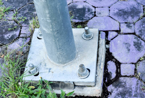istock Steel base plate of electrical lighting pole. 1065450966