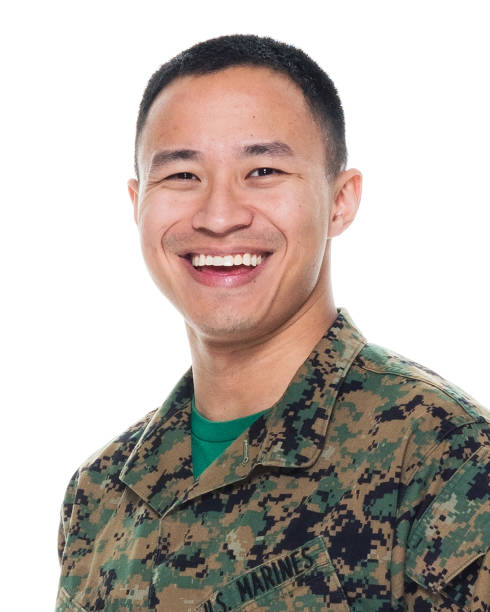 istock US Marine in uniform standing with hands by side 1065452654