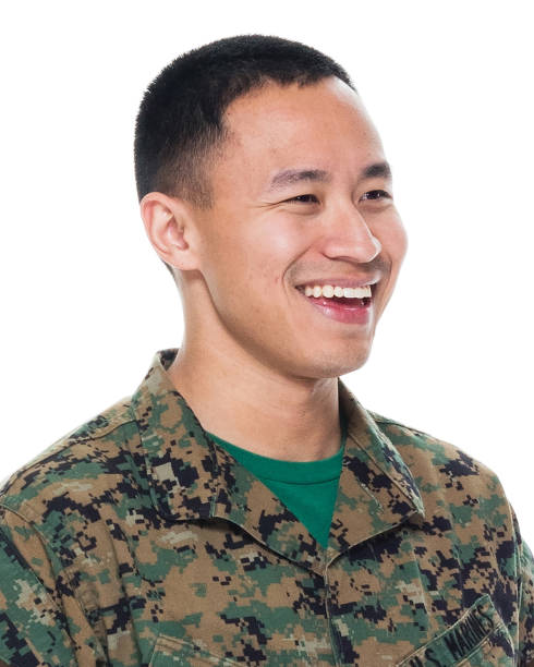 istock US Marine in uniform standing with hands by side 1065452660