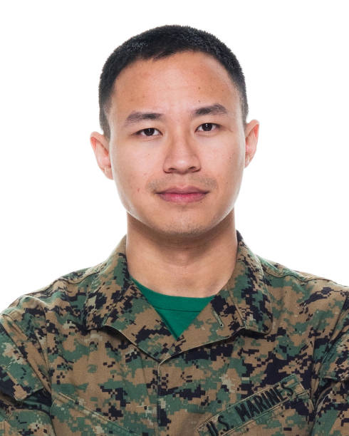 istock US Marine in uniform with arms crossed 1065452758