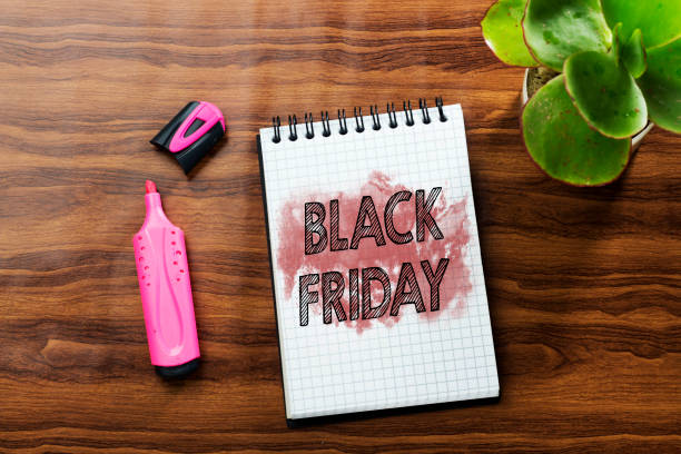 istock black friday text concept in notebook on wood table with pink felt pen and succulent plant pot 1065453206