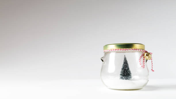 istock Christmas tree in a glass jar 1065457876