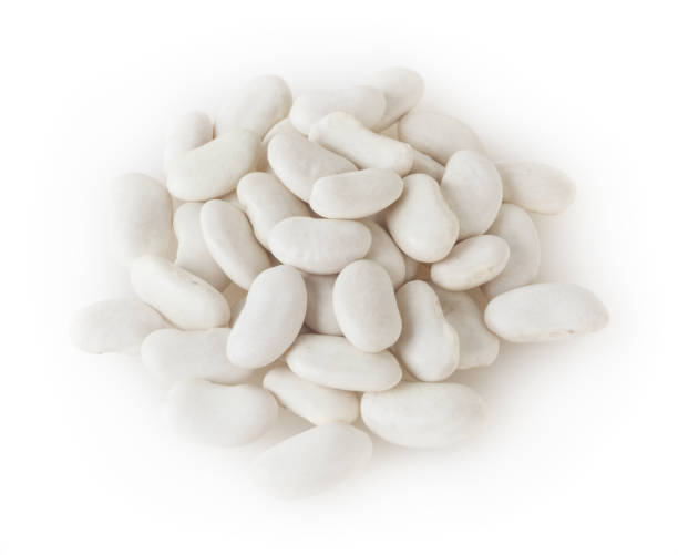istock Heap of white beans isolated on white background with clipping path 1065467120