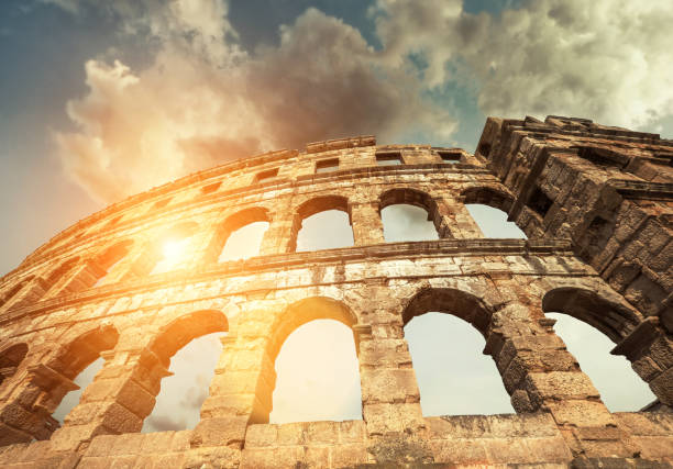 istock Pula Amphitheatre with white clouds sky, Istria, Croatia 1065469680