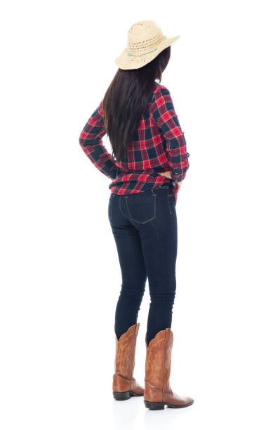 istock Beautiful young latino female standing with hands on hips 1065482784